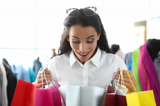 Surprised lady with bags