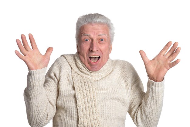 Photo surprised mature man posing against white background