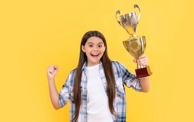 Surprised teen champion girl in studio teen champion girl on background