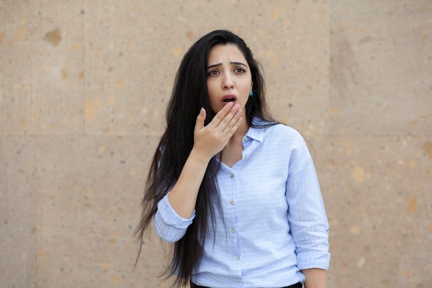 Surprised woman in street