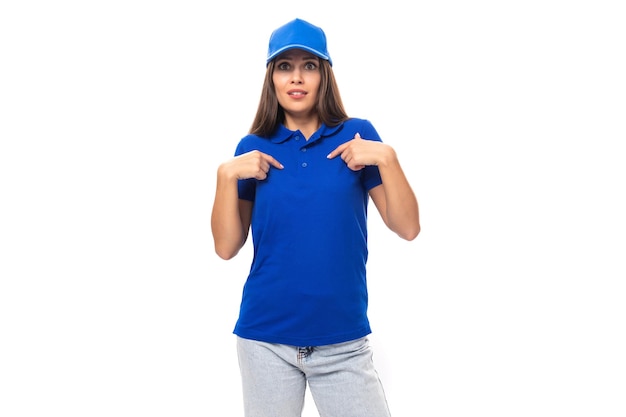 Surprised young woman in blue cotton tshirt and cap with space for print