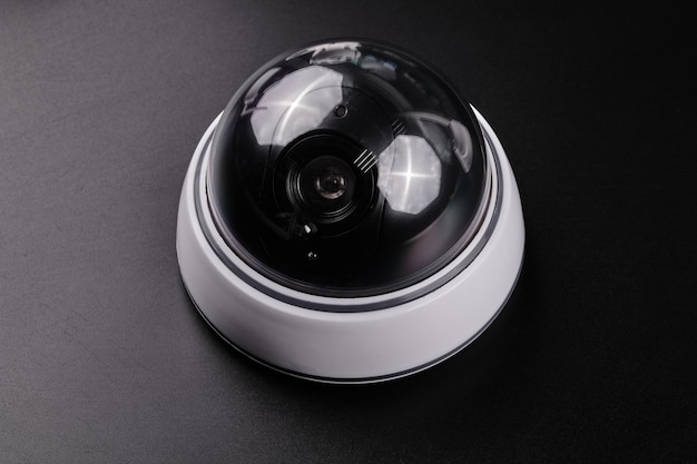 Surveillance camera videcam cctv camera isolated on black background close up home security system concept