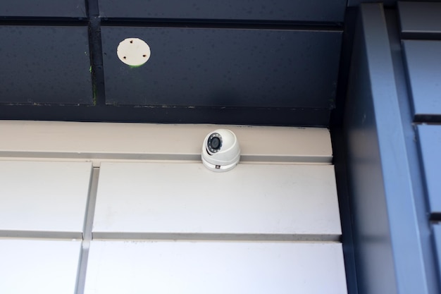 Surveillance camera on the wall of the building