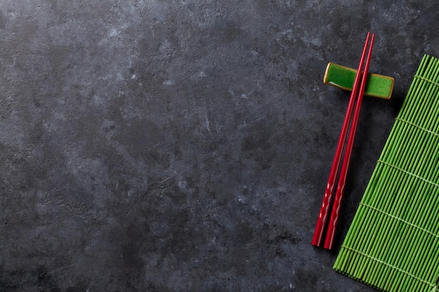 Sushi chopsticks on stone table