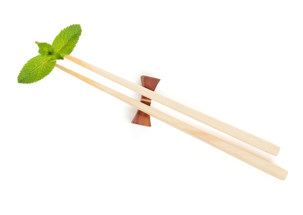 Sushi chopsticks with mint leaves