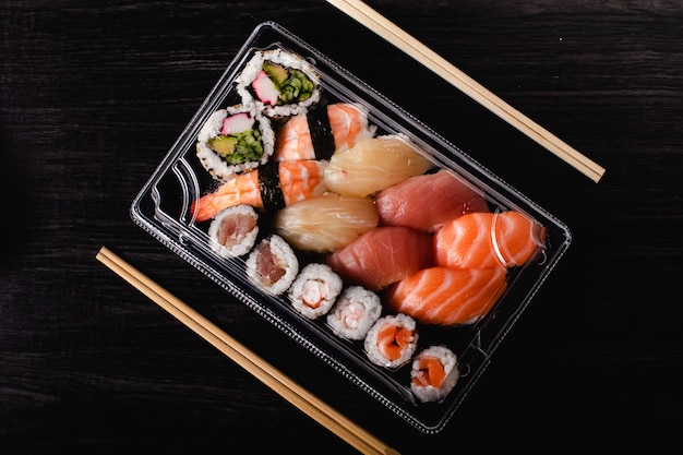 Sushi to go concept. Takeaway box with sushi