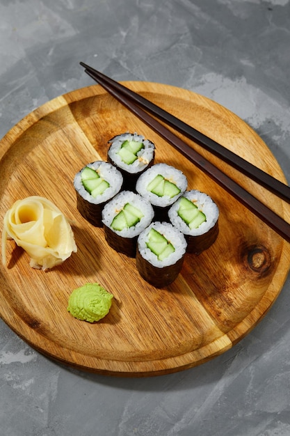 Sushi Maki rolls cucumber Fresh hosomaki pieces with rice and nori Close Up of delicious japanese food with sushi roll