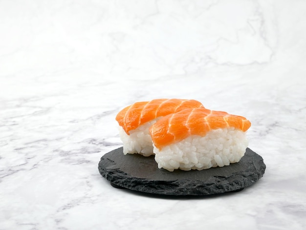 Photo sushi on marble background