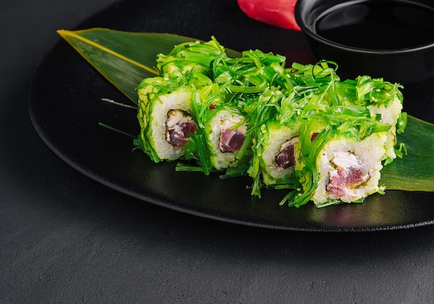 Sushi plate on black stone japanese food