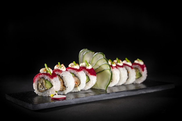 Sushi on a plate dark food photography style