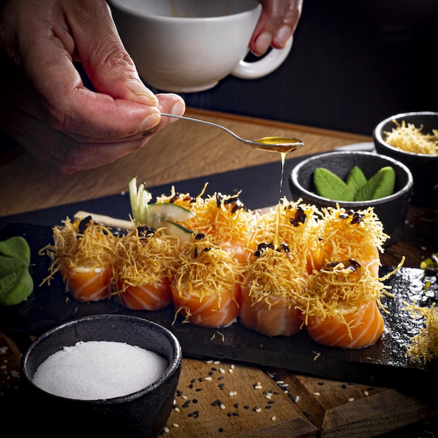 Sushi on a plate dark food photography style