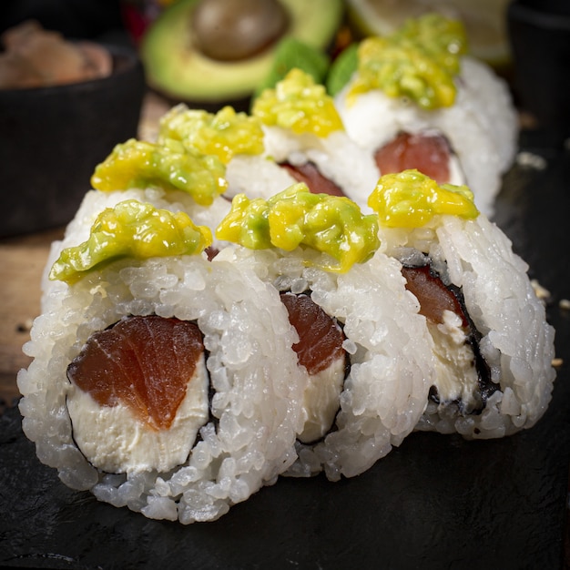 Sushi on a plate dark food photography style