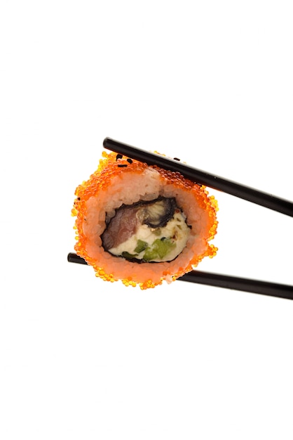 Sushi roll on chopsticks