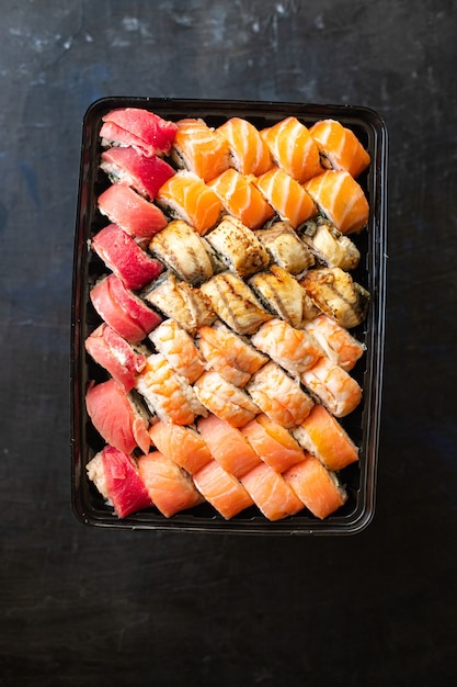 Sushi roll seafood maki susi salmon tuna rice nori wasabi sesame asian food