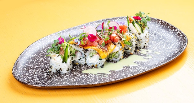 Sushi roll with crab under melted cheese Sushi trend Creative food