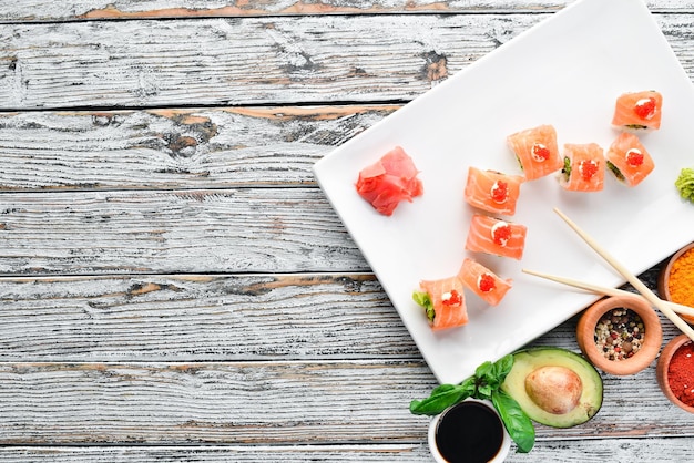 Sushi roll with salmon mussels and caviar Japanese cuisine Top view