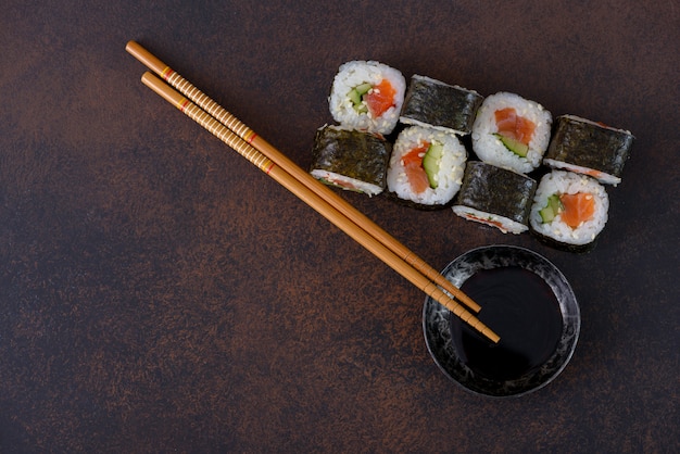 Sushi roll with soy sauce