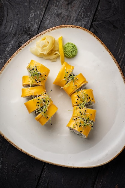 sushi roll with wasabi  on the plate. delicious food, close-up