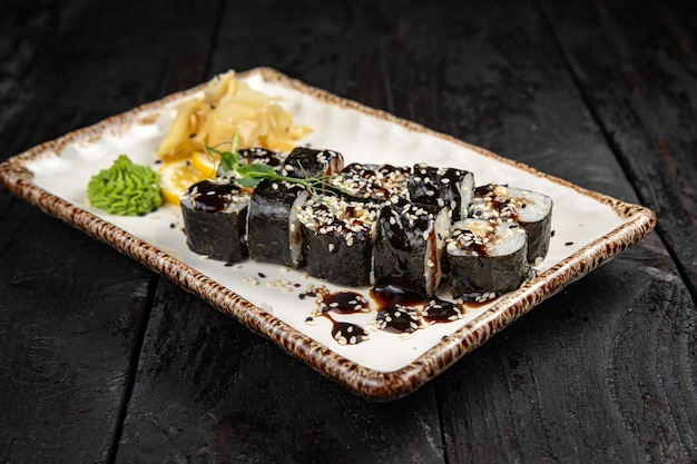 sushi roll with wasabi  on the plate. delicious food, close-up