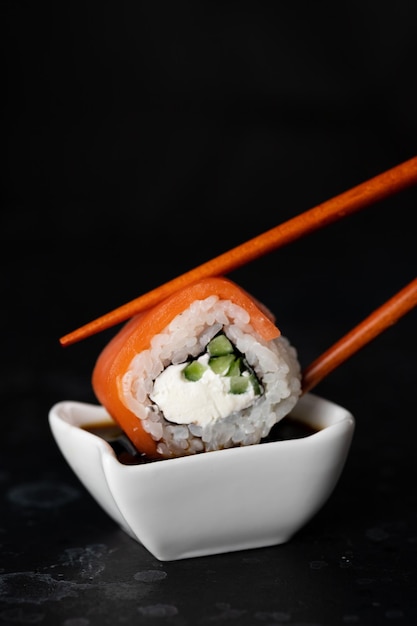 Sushi and rolls cooked on the table