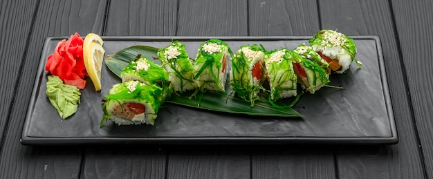Sushi rolls, nigiri, raw salmon, pickled ginger Asian food Dinner