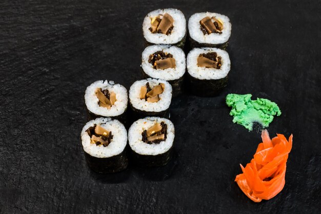 Sushi rolls on table