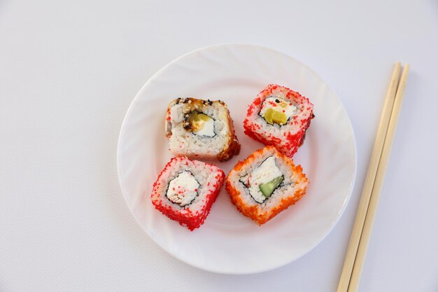 Sushi rolls on a white background closeup