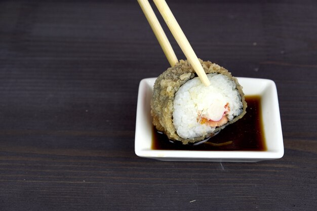 Sushi rolls on a white plate