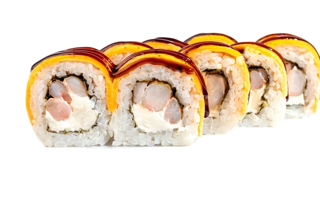 Sushi and rolls with caviar shrimp and tuna avocado on a white background Isolates Copy space