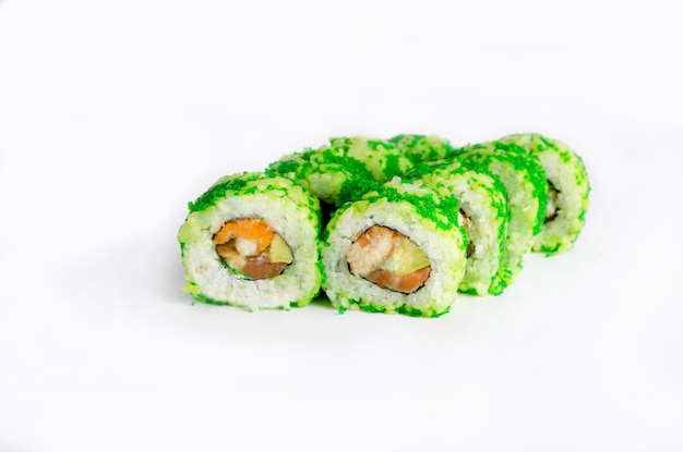 Sushi rolls with salmon and green tobiko flying fish roe