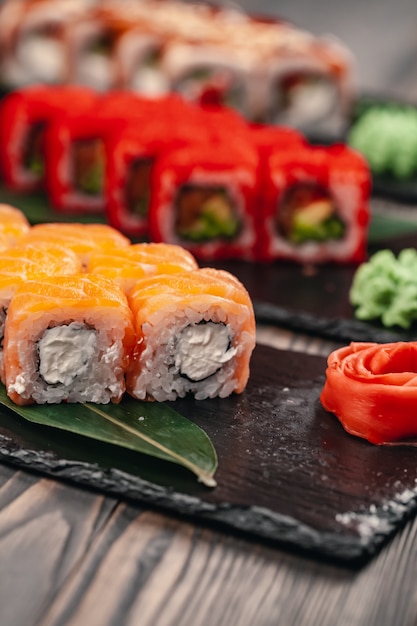 Sushi served on a slate plate in a restaurant