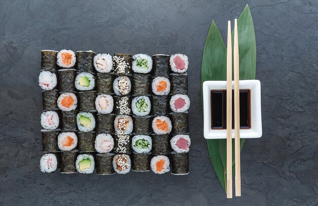 Sushi set on a black surface