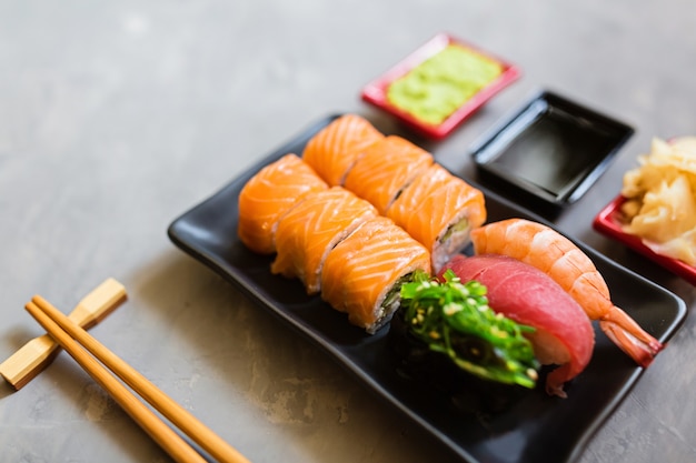 Sushi set on gray concrete