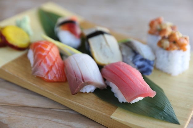 Sushi Set nigiri and sushi rolls on wood table