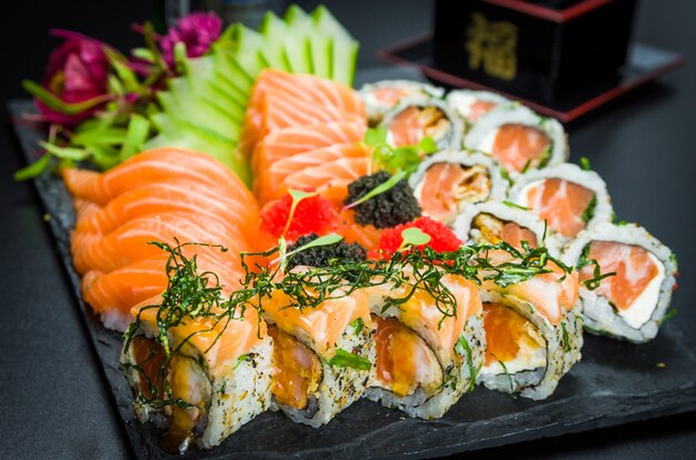 Sushi set. Traditional Japanese cuisine, premium sushi decorated in elegant surroundings.