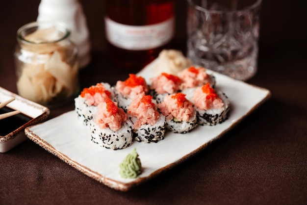 Sushi set with red caviar, beautifully presented on the table