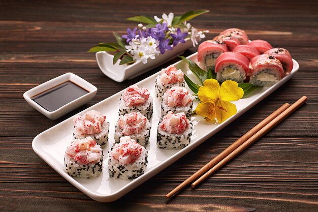 Sushi set on a wooden background with ginger