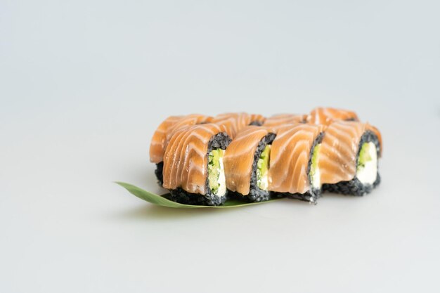 sushi with salmon and avocado.