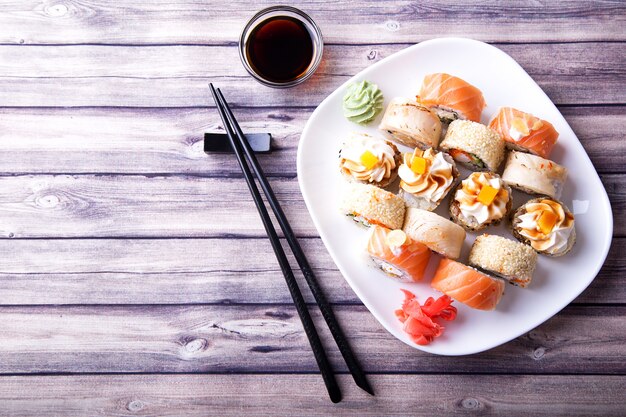 Sushi with soy and chopsticks