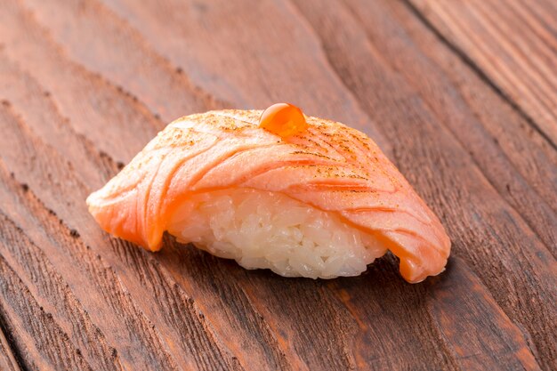 Sushi on the wooden table.