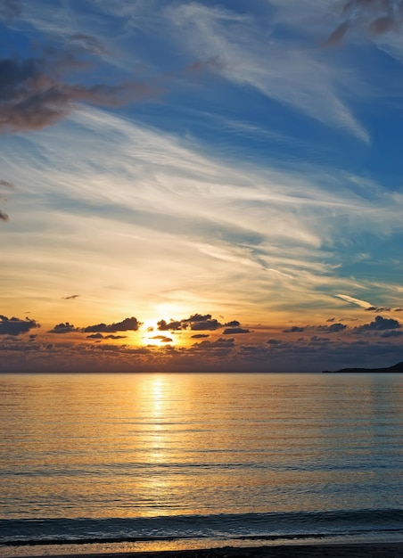 Susnet with scenic clouds in Alghero Italy