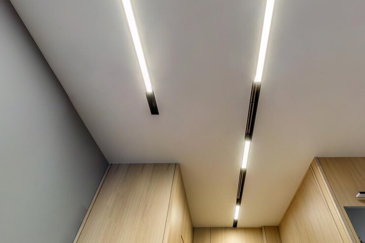  Suspended ceiling with halogen spots lamps and drywall construction in empty room in apartment or h