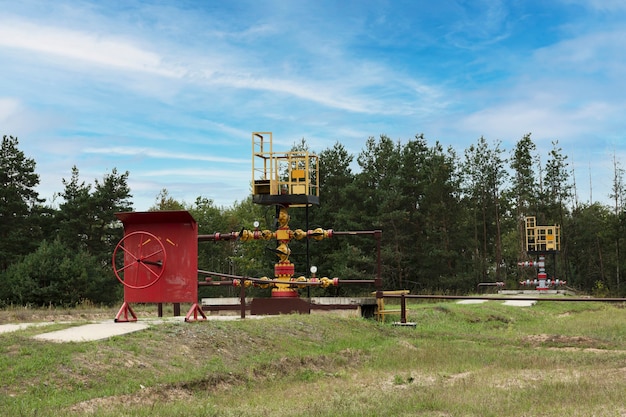 Suspended, frozen, clogged oil well. Copy space.