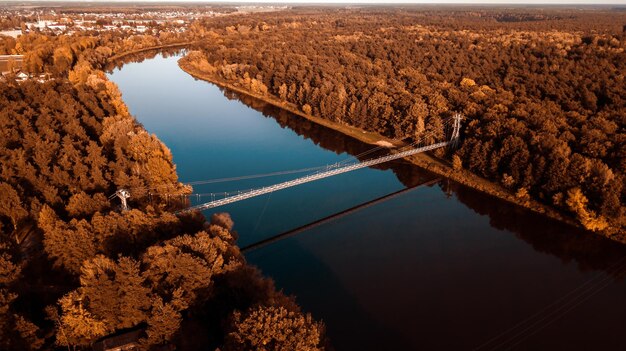 Suspension bridge over the river