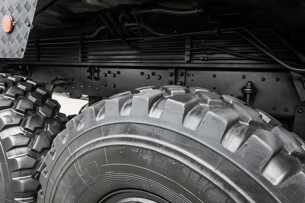 Suspension and large wheels of a truck loader or other constructio