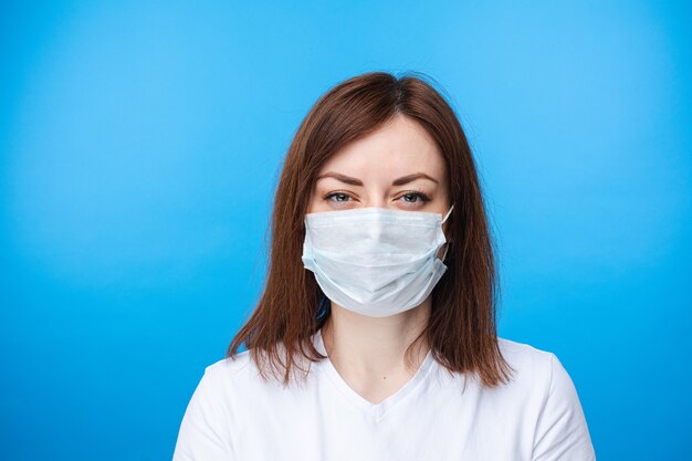 Suspicious woman in aseptic mask