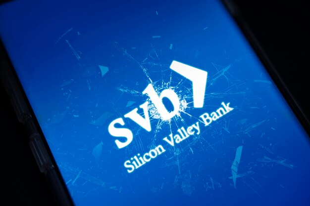 SVB logo with broken mobile phone screen