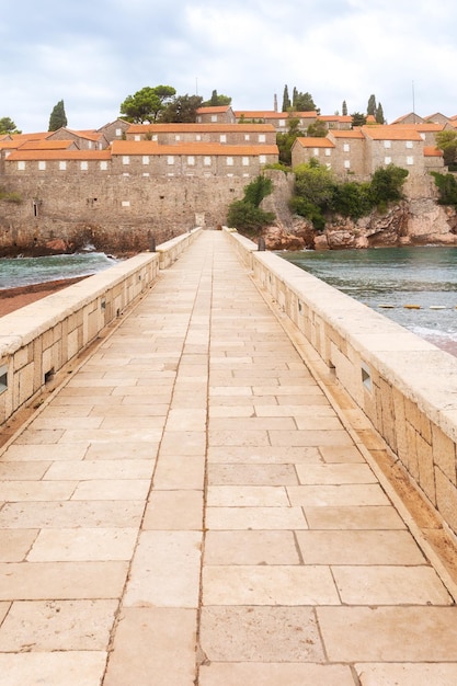 Sveti Stefan island in Montenegro and beach view