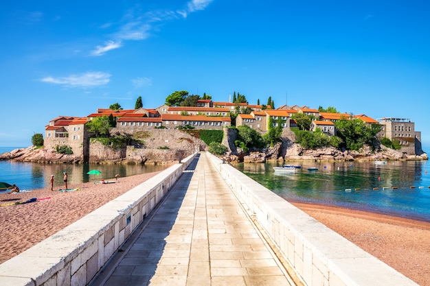 Sveti Stefan island, view from the beach to the entrance, Budva riviera, Montenegro.