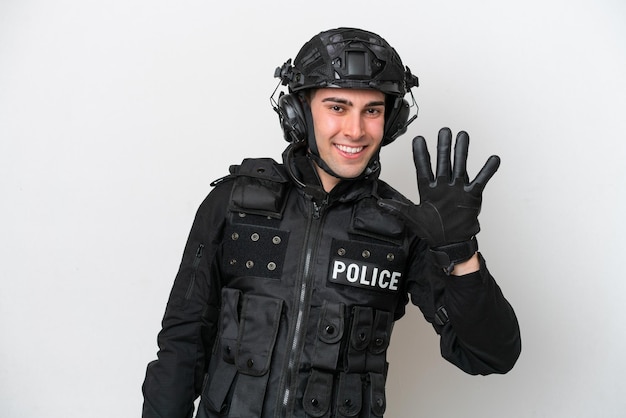 SWAT caucasian man isolated on white background counting five with fingers